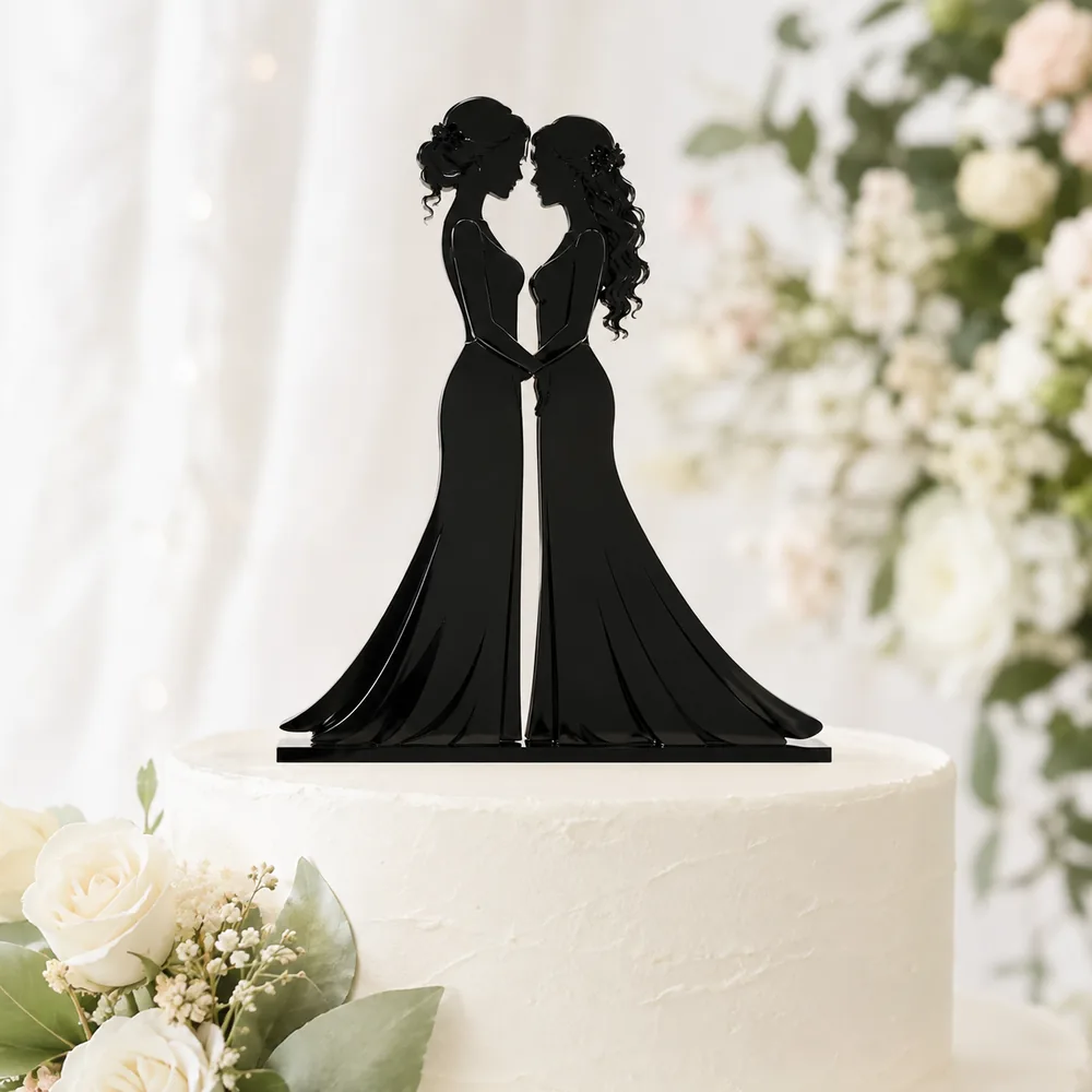 Black acrylic silhouette cake topper of two brides in wedding gowns