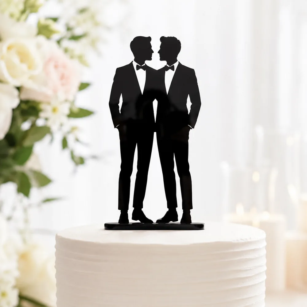 Black acrylic silhouette cake topper of two grooms in tuxedos