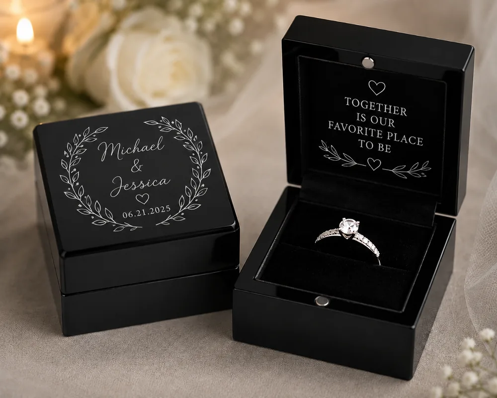 Engraved black ring boxes
